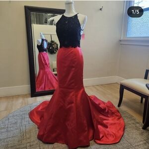 Size 6/8 red & black two piece Sherri Hill style #52851. Altered but never worn.